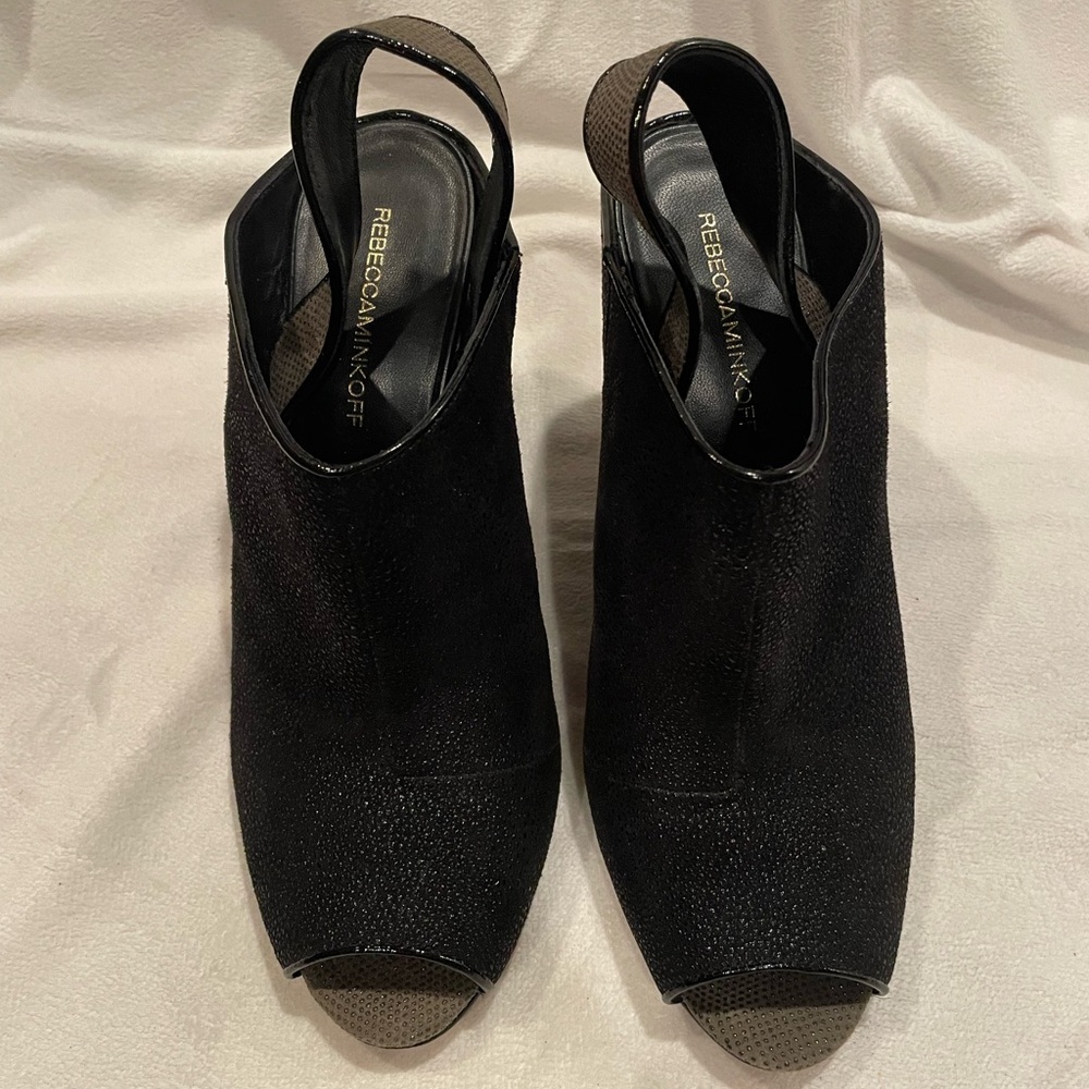 Rebecca Minkoff black heeled sling back wedges.